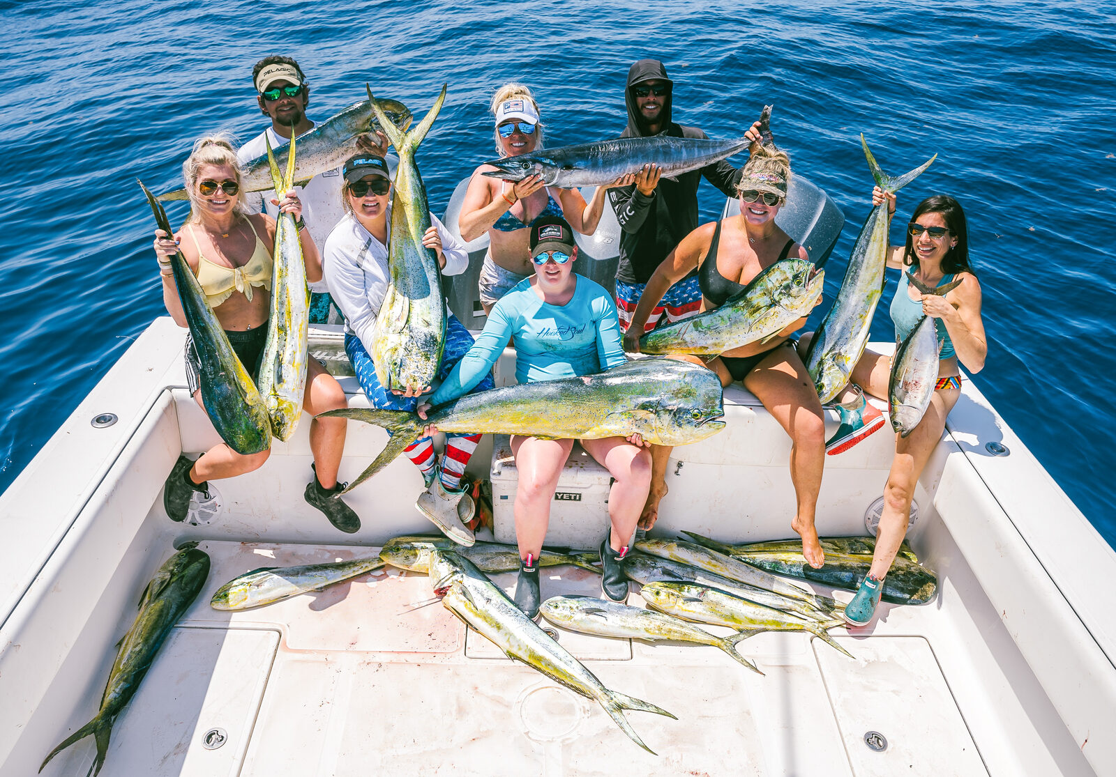 4 Sons Charters crew with a catch